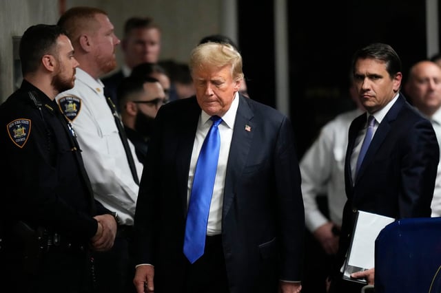 Former President Donald Trump walks to make comments to members of the media after being found guilty on 34 felony counts of falsifying business records in the first degree at Manhattan Criminal Court, Thursday, in New York, on May 30, 2024.