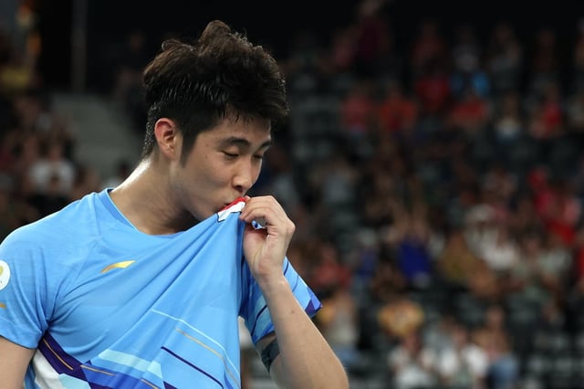 Loh Kean Yew has gained an extra following in China to go with his new hero status in Singapore. Photo: Xinhua