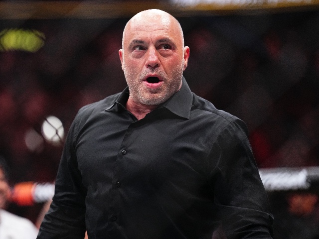 LAS VEGAS, NEVADA - APRIL 13: Joe Rogan reacts to the knockout win by Max Holloway in the BMF championship fight during the UFC 300 event at T-Mobile Arena on April 13, 2024 in Las Vegas, Nevada. (Photo by Chris Unger/Zuffa LLC via Getty Images)