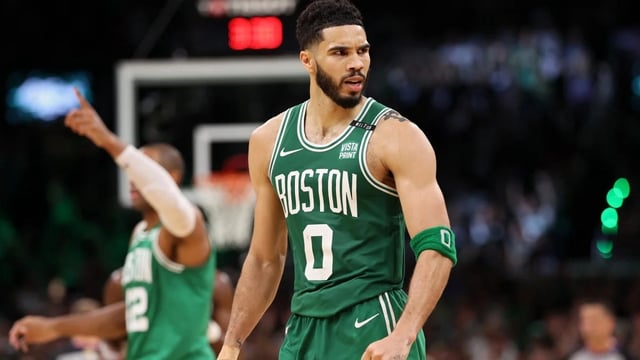 Jayson Tatum #0 of the Boston Celtics celebrates after a play against the Dallas Mavericks (Photo by Elsa/Getty Images)