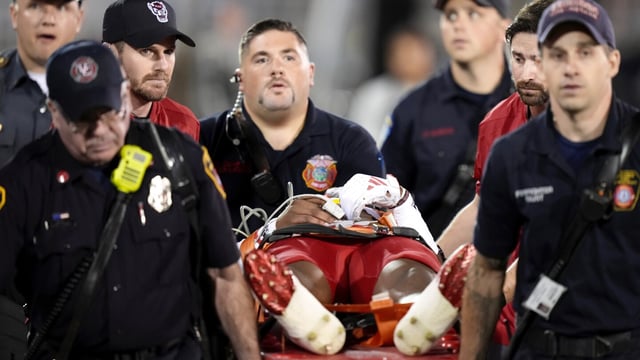North Carolina State's Rakeim Ashford is carted off of the field after being injured in the third quarter of an NCAA college football game against UConn in East Hartford, Conn., Thursday, Aug. 31, 2023. (AP Photo/Bryan Woolston)