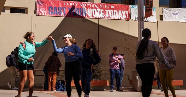 Dance majors from the Department of Theater and Dance perform under a banner encouraging students to vote at the Union Building at the University of Texas at El Paso in El Paso on Oct. 25, 2022.