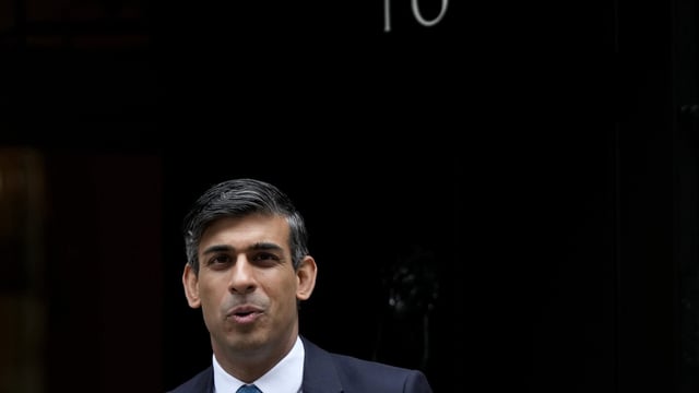 FILE - Britain's Prime Minister Rishi Sunak leaves 10 Downing Street to attend the weekly Prime Ministers' Questions session in parliament in London, on July 19, 2023. British lawmakers headed back to Parliament on Monday Sept. 4, 2023 after their summer break. But thousands of U.K. children won’t be returning to their classrooms this week, because their schools are at risk of collapse from crumbling concrete. (AP Photo/Frank Augstein, File)