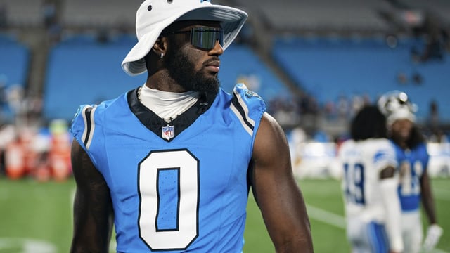 FILE - Carolina Panthers outside linebacker Brian Burns (0) looks on after a preseason NFL football game against the Detroit Lions Friday, Aug. 25, 2023, in Charlotte, N.C. Brian Burns sat out his second consecutive practice Monday, Sept. 4, because of a contract dispute, raising questions about whether the two-time Pro Bowler will play in Sunday’s regular-season opener against the Atlanta Falcons. (AP Photo/Jacob Kupferman, File)