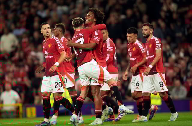 Manchester United's Joshua Zirkzee celebrates scoring against Fulham during the Premier League match at Old Trafford, Manchester, on August 16, 2024.