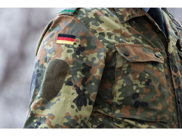 A German soldier during an honor guard at the Chancellery in Berlin, Germany, on Thursday, March 31, 2022. Germany this month decided to rearm its military with a cash injection of 100 billion ($110 billion) and spend at least 2% of gross domestic product on defense in the coming years. Photographer: Bloomberg/Bloomberg