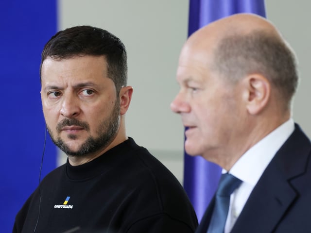 BERLIN, GERMANY - MAY 14: (L-R) Ukrainian President Volodymyr Zelensky looks on as German Chancellor Olaf Scholz speaks to the media during a press conference at the Chancellery on May 14, 2023 in Berlin, Germany. This is Zelensky's first visit to Germany since Russia invaded Ukraine last year. Germany is among Ukraine's firmest supporters and has supplied its military with a wide range of weapons. Zelensky is scheduled to travel to Aachen later today, where he is to receive the International Charlemagne Prize. (Photo by Sean Gallup/Getty Images)