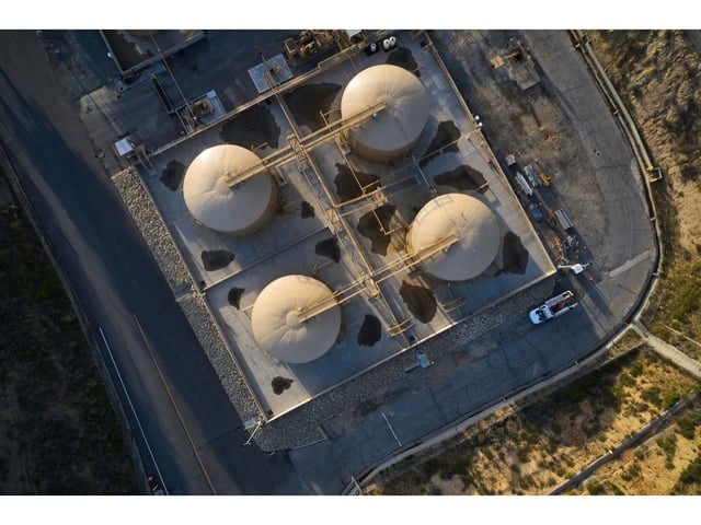 Above-ground storage tanks at the Southern California Gas Co. (SoCalGas) Honor Rancho underground natural gas storage facility in Santa Clarita, California, U.S., on Friday, April 22, 2022. U.S. natural gas prices have almost doubled this year to the highest since the shale revolution more than a decade ago, driving up energy costs and helping fuel the fastest inflation in 40 years. Photographer: Bing Guan/Bloomberg