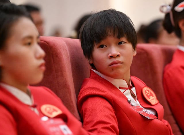 Diver Quan Hongchan at the event in Beijing. Photo: Xinhua