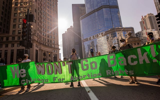 Abortion rights protesters march in Chicago on August 18, 2024.