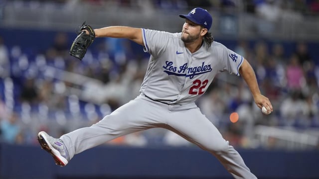 Los Angeles Dodgers' Clayton Kershaw delivers a pitch during the first inning.