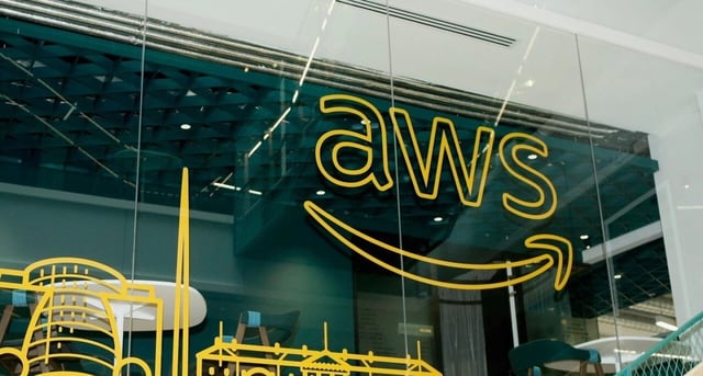 An image about Amazon Web Services CEO suggests developers may not be coding in two years