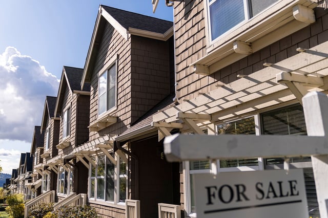 A "For Sale" sign in front of a home in the Issaquah Highlands area of Issaquah, Washington, US, on Tuesday, April 16, 2024.