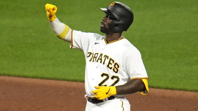 Pittsburgh Pirates' Andrew McCutchen celebrates as he stands on second base after driving in a run with a double off Milwaukee Brewers starting pitcher Corbin Burnes during the fifth inning of a baseball game in Pittsburgh, Monday, Sept. 4, 2023. (AP Photo/Gene J. Puskar)