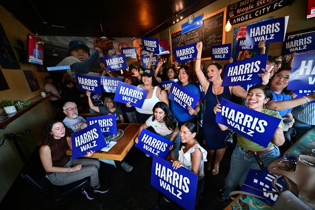 Supporters of the Latinos for Harris-Walz campaign at a party in Los Angeles to watch Kamala Harris deliver her DNC speech in Chicago on Aug. 22, 2024. 