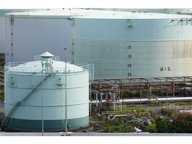 Oil storage tanks in the Keihin industrial area in Yokohama, Kanagawa Prefecture, Japan, on Wednesday, Oct. 11, 2023. Oil dropped for a third day, erasing all of the surge on Monday that followed Hamas' attack on Israel over the weekend. Photographer: Toru Hanai/Bloomberg