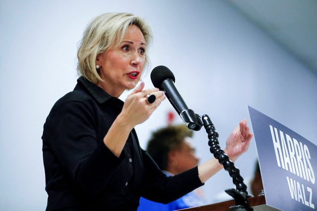 Gwen Walz, wife of Democratic vice presidential nominee Minnesota Governor Tim Walz, speaks at an "Educators for Harris-Walz" campaign event in Manassas, Virginia on August 30, 2024.