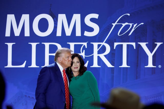 Republican presidential nominee and former U.S. President Donald Trump and Moms for Liberty co-founder Tiffany Justice participate in a fireside chat during the Moms for Liberty National "Joyful Warriors" Summit, in Washington, U.S., August 30, 2024. REUTERS/Evelyn Hockstein