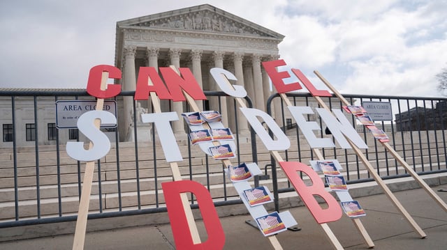 In this 2023 file photo, a sign calling for student loan debt relief is seen in front of the Supreme Court as the justices were scheduled to hear oral arguments in two cases involving President Joe Biden's bid to reinstate his plan to cancel billions of dollars in student debt in Washington, DC, on February 28, 2023.