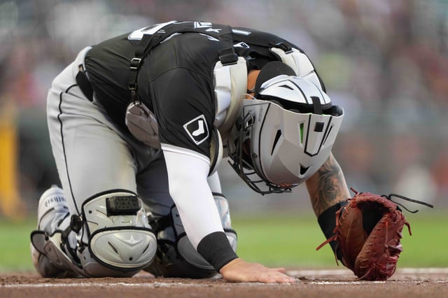 Catcher Korey Lee reacts after getting hit by a pitch against the Giants.