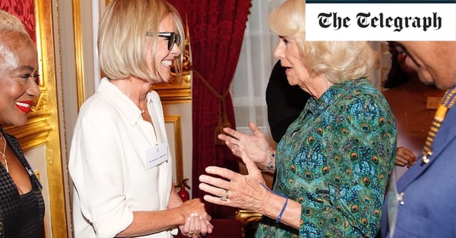 The Queen speaks with Mariella Frostrup at the reception at St James's Palace, London to mark the 70th anniversary of Book Aid International