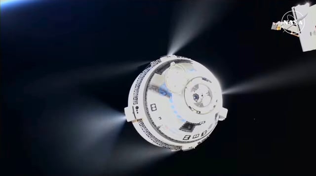 Boeing’s Starliner space capsule fires its thrusters as it leaves the International Space Station. (NASA via YouTube)