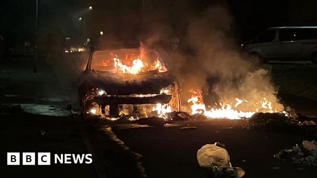 A Ford Focus set alight on Highmead Road, Ely, Cardiff, during a "large scale disorder" following a serious road traffic collision on Snowden Road in Ely.