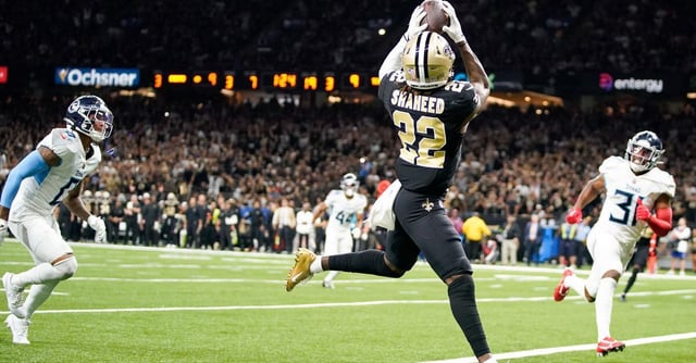 Sep 10, 2023; New Orleans, LA, USA; New Orleans Saints wide receiver Rashid Shaheed (22) scores a touchdown in the third quarter against the Tennessee Titans at the Caesars Superdome. Mandatory Credit: Andrew Nelles-USA TODAY Sports