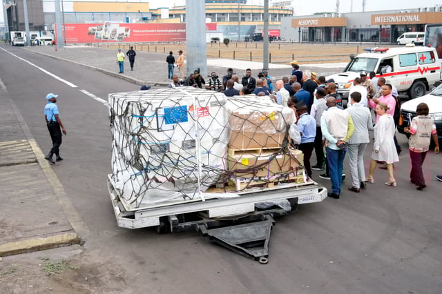 Offiicials stand near mpox vaccines as first batches arrive at N'Djili International Airport in Kinshasa, Democratic Republic of Congo September 5, 2024. REUTERS/Justin Makangara/File Photo