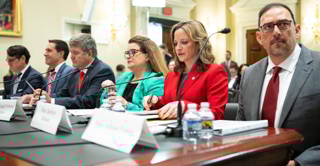 Testifying to a House panel Wednesday on securing elections are, from right, secretaries of state Adrian Fontes of Arizona, Jocelyn Benson of Michigan, Maggie Toulouse Oliver of New Mexico, Mac Warner of West Virginia, Frank LaRose of Ohio, and Cord Byrd of Florida. (Bill Clark/CQ-Roll Call/Getty Images)