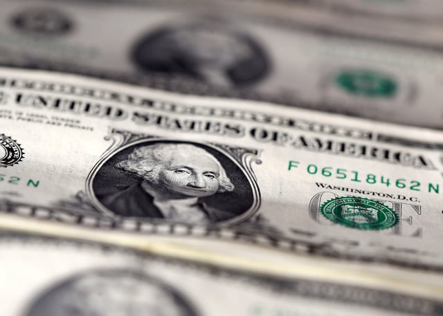 U.S. dollar notes are seen in this November 7, 2016 picture illustration.   REUTERS/Dado Ruvic/Illustration/File Photo
