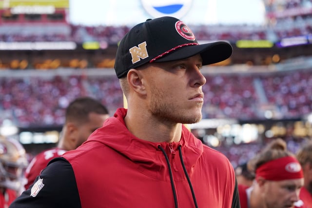 San Francisco 49ers running back Christian McCaffrey (23) watches from the sideline due to injury during the second quarter against the New York Jets at Levi's Stadium in San Francisco on Sept. 9, 2024.