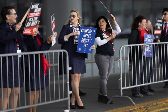 American Airlines flight attendants outside O’Hare International Airport to demand higher wages  in Chicago on May 9, 2024.