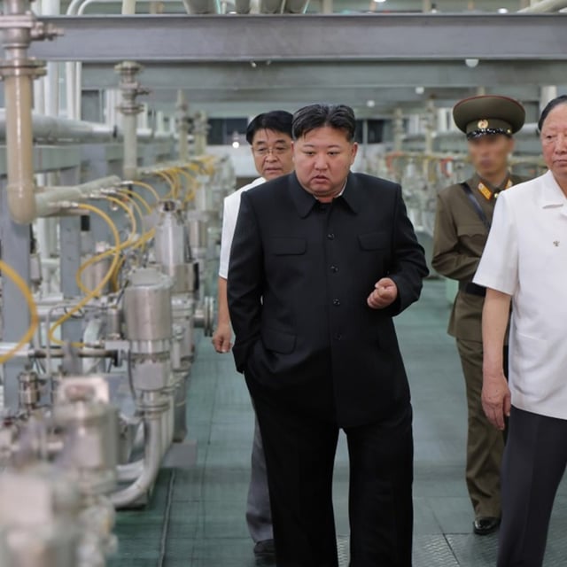 North Korean leader Kim Jong Un is given a tour of a uranium enrichment facility on September 12.