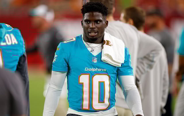 Tyreek Hill of the Miami Dolphins plans to fight two tickets he received during a traffic stop outside Hard Rock Stadium.