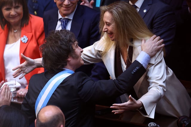 Argentine President Javier Milei greets his sister, General Secretary of the Presidency Karina Milei, on the day he presents the fiscal year 2025 budget, at the National Congress in Buenos Aires, Argentina, September 15, 2024. REUTERS/Agustin Marcarian