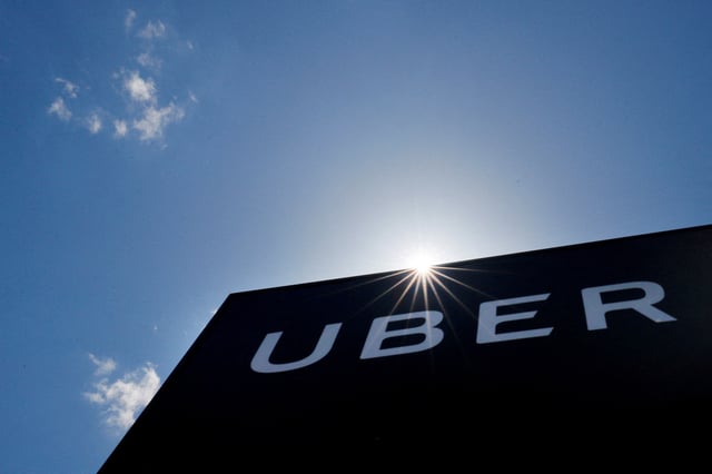 A sign marks the offices of Uber in Saugus, Massachusetts, U.S., May 8, 2019.   REUTERS/Brian Snyder/File Photo
