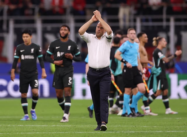 Soccer Football - Champions League - AC Milan v Liverpool - San Siro, Milan, Italy - September 17, 2024 Liverpool manager Arne Slot applauds fans after the match REUTERS/Claudia Greco