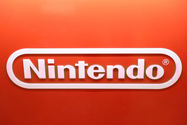 Nintendo logo is seen in a GameStop in Manhattan, New York, U.S., December 7, 2021. REUTERS/Andrew Kelly/File Photo