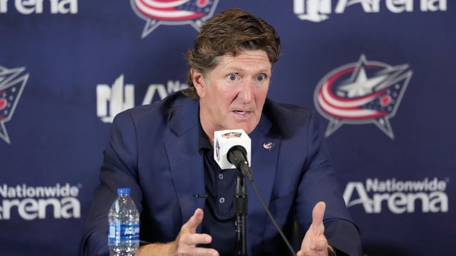 FILE - New Columbus Blue Jackets NHL hockey head coach Mike Babcock speaks to the media during an introductory press conference Saturday, July 1, 2023, in Columbus, Ohio. Babcock and Boone Jenner blasted comments made on a hockey podcast about the new Columbus Blue Jackets coach asking the captain to show him photos on his phone. (Kyle Robertson/The Columbus Dispatch via AP, File)
