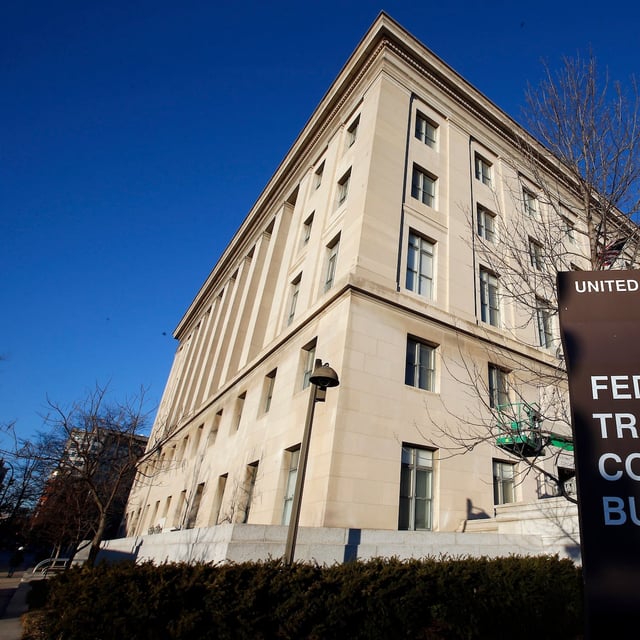 FILE - The Federal Trade Commission building is seen, Jan. 28, 2015, in Washington. The Federal Trade Commission is taking action against Arise Virtual Solutions, a gig work company, saying it misled consumers about the money they could make on its platform. (AP Photo/Alex Brandon, File)