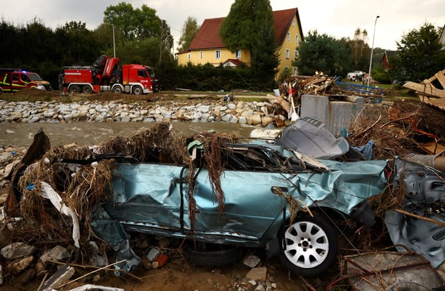 A car damaged by the flood wave of Biała Ladecka river is seen aftermath of flooding in Ladek Zdroj, Poland, September 19, 2024. REUTERS/Kacper Pempel
