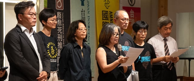 Hsinyi Lin (C), executive director of the Taiwan Alliance to End the Death Penalty, speaks while representatives from the Taiwan Alliance to End the Death Penalty and human rights groups listen during a press conference after the Taiwan Constitutional Court ruled to retain death penalty, in Taipei on September 20, 2024. (Photo by Yan ZHAO / AFP) (Photo by YAN ZHAO/AFP via Getty Images)