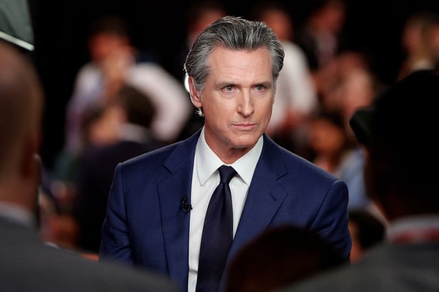California Gov. Gavin Newsom speaks to reporters after the CNN presidential debate in Atlanta on June 27, 2024.