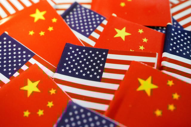 Flags of U.S. and China are seen in this illustration picture taken August 2, 2022. REUTERS/Florence Lo/Illustration/File Photo