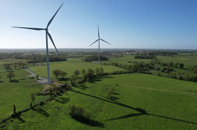 A drone view shows power-generating windmill turbines at a wind park in La Regrippiere, near Nantes, France, April 17, 2024. REUTERS/Stephane Mahe/File Photo