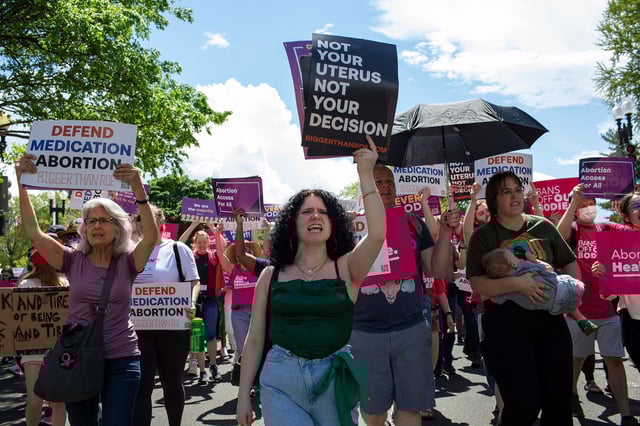 WASHINGTON, DISTRICT OF COLUMBIA, UNITED STATES - 2023/04/15: Activists holding abortion rights signs shout slogans while joining in a rally.  Abortion rights activists rallied  outside the US Supreme Court in Washington, DC.  On April 14, the Court temporarily preserved access to mifepristone, a widely used abortion pill, in an 11th-hour ruling preventing lower court restrictions on the drug from coming into force. (Photo by Probal Rashid/LightRocket via Getty Images)