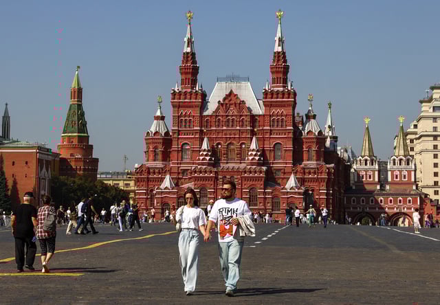 People walk in Red Square near the State Historical Museum and the Kremlin wall in central Moscow, Russia September 10, 2024. REUTERS/Evgenia Novozhenina/File Photo