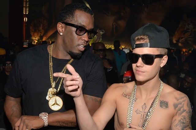 Sean 'Diddy' Combs and Justin Bieber attend Ciroc party at Vanquish Lounge, in Atlanta, on Feb. 5, 2014.